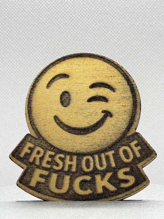 Fresh Out of Fucks Winking Laser Engraved Emoji Magnet